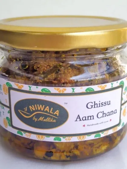 A jar of my special Ghissu Aam Chana pickle. The combination of grated mango and chickpeas creates a wonderful texture and a flavour that is truly one of a kind.