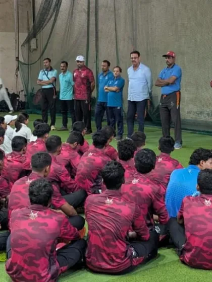 The coaching team and I observing the players as we prepare them for the day's training session at the indoor nets.
