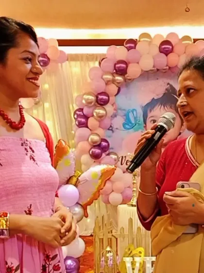 Another shot of me listening intently to a guest's feedback. These personal interactions are invaluable and help me ensure everyone is having a wonderful time.