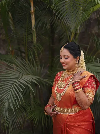A lovely portrait of Shreya, her makeup soft and elegant, complementing her traditional attire.