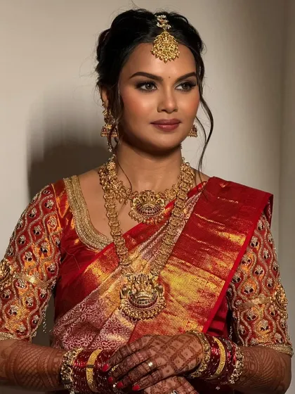 For the bride who loves timeless tradition, I offer exquisite gold-look temple jewellery. This set, featuring intricate carvings and a classic design, brings a touch of divine elegance to your wedding ceremony, especially for a South Indian bridal look.