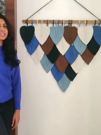 Experience the beauty of rustic charm with our handwoven macrame leaf hanging. The blend of blues, browns, and off-white adds a touch of nature-inspired beauty perfect for boho aesthetics.