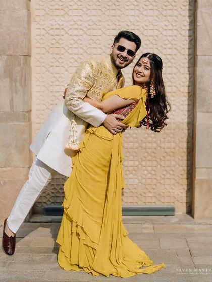 A fun and playful pose. I encourage couples to have fun during their shoot, which results in natural and happy photos.