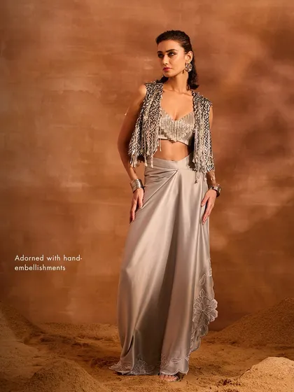 The Blaze Co-ord Set, adorned with hand-embellishments, is a standout ensemble designed for a glamorous and fashion-forward look.