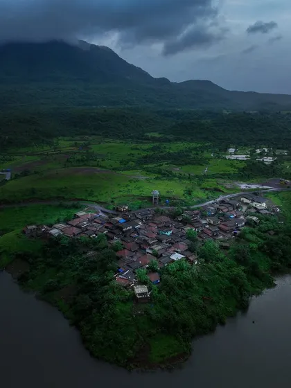 Another view of the village at Kondeshwar, with the mountains looming in the background. It shows how close nature is to the settlements here.