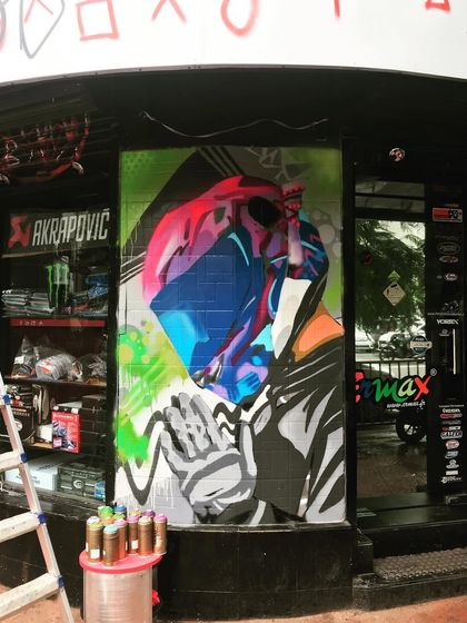 A wide shot showing the mural in progress. We can work in various environments to bring large-scale art projects to life.