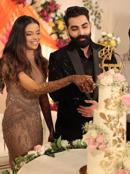 It's always an honor to see my cakes as part of such a special moment. Here is the happy couple cutting their engagement cake.