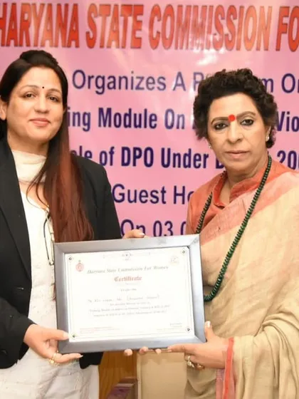 Receiving a certificate from the Haryana State Commission for Women for my contribution to a training module on the Domestic Violence Act, 2005.