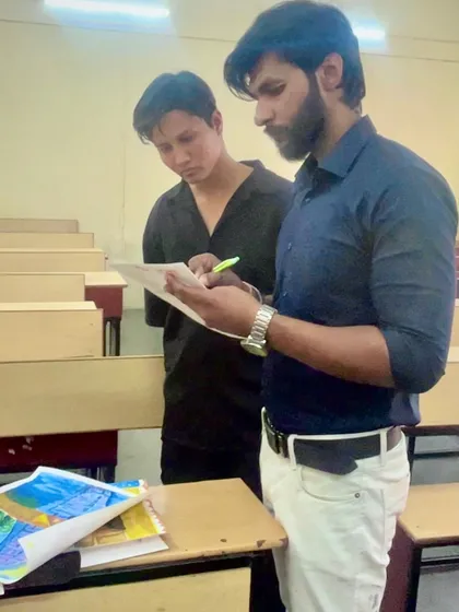 Here I am judging an art competition at a Delhi college. I love engaging with the art community and helping young artists grow, and I bring that same supportive energy to my studio classes.