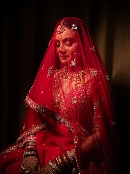 Portraits of my bride Sameera. I created a beautiful look that complemented her dusky skin tone and classic red lehenga.