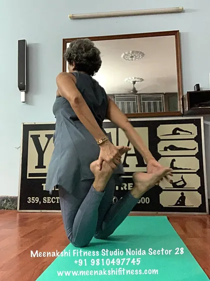 A kneeling quadriceps stretch that prepares the body for deeper backbends like Bow Pose and Camel Pose.