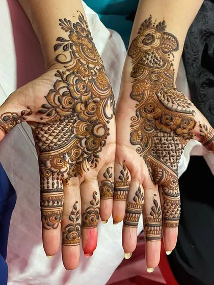 It was great to create this piece, which features a mix of checks, florals, and paisleys. The different patterns on each hand make it a unique and artistic set.