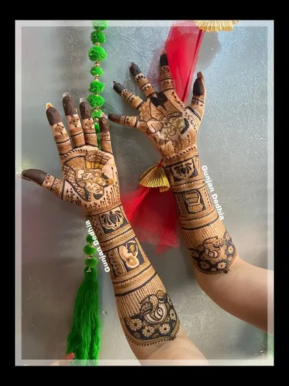 An intricate design created for a Mundan ceremony. It features traditional peacock motifs and other auspicious symbols for the special day.