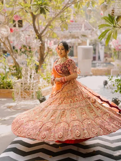 Another beautiful twirl, showcasing the stunning flare of the lehenga. The bride's smile and glowing makeup are the perfect accessories.