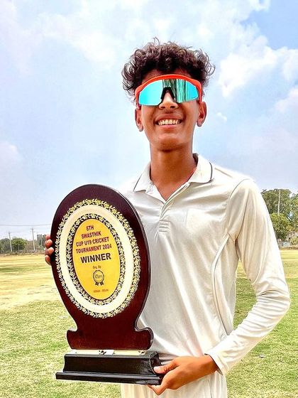 Another one of our smiling champions with his trophy.