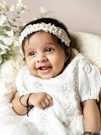 Another adorable smiling shot. We take plenty of photos to make sure we capture that one perfect expression you'll want to remember forever.