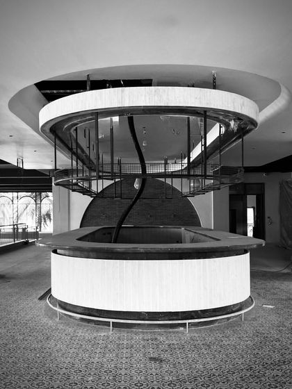 A work-in-progress shot of a pub's central bar, showing the bare structure before the final finishes are applied. This image offers a glimpse into the construction phase of our designs.