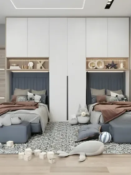 A symmetrical design for a shared children's room, with two separate beds featuring built-in headboard storage. The central wardrobe unit divides the space, giving each child a sense of their own area.