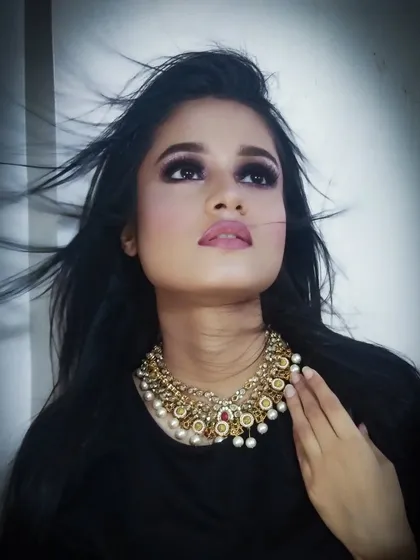 This is a dramatic photoshoot look with a bold smokey eye and a soft pink lip. It shows my ability to create high-fashion and editorial makeup styles that are perfect for the camera.