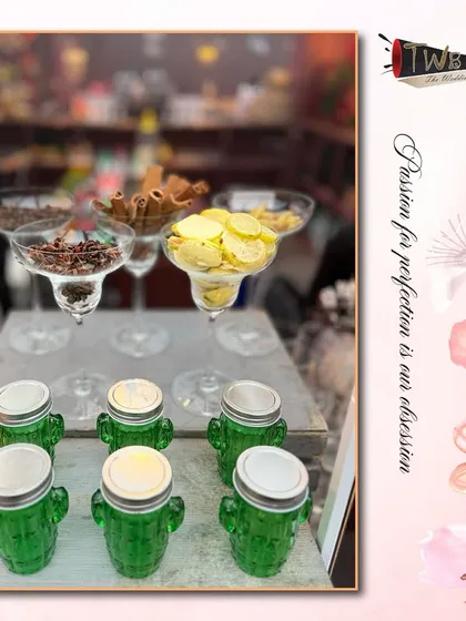 A close-up of our cactus-shaped glasses and a display of fresh spices and garnishes.