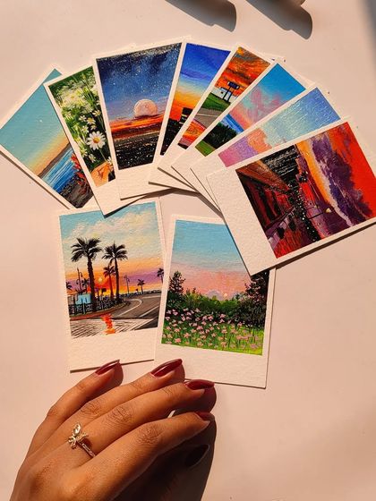 Another shot of my 2023 art dump, featuring a collection of my custom polaroid paintings. I'm so grateful for every commission.