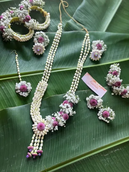 A top-down view of the complete jasmine bud jewellery set, showing all the matching pieces together.