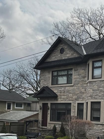 An aesthetic shot of a suburban house, contributing to a "day in the life" photo dump.