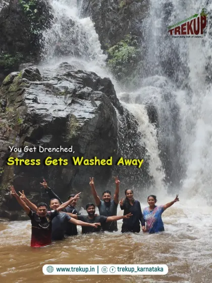 A group celebrating together in a waterfall. The caption reads, "You get drenched, stress gets washed away."