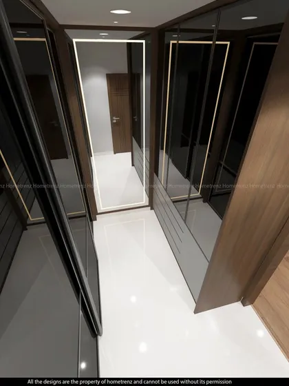 A view of the walk-in closet area, with dark wood and smoked glass wardrobes providing ample, stylish storage.