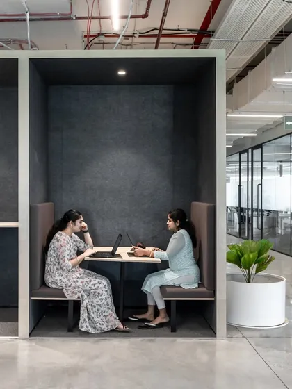 A workplace should empower people, not distract them. Here, we designed intimate collaboration pods that provide a space for focused discussion, proving that functional design can soften the corporate edge while remaining authentic and purposeful.