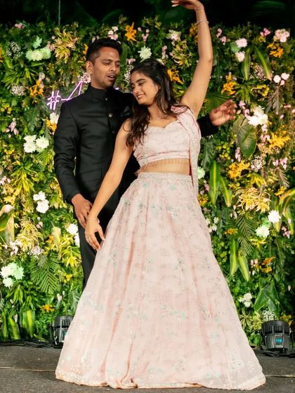 A graceful pose that highlights the bride's beautiful lehenga. I always consider the outfits when creating the choreography.