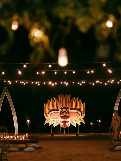 We believe in weaving local culture into our designs. For this Sri Lankan beach celebration, we incorporated an iconic traditional mask as a powerful and meaningful backdrop, connecting the decor to the heritage of the place.