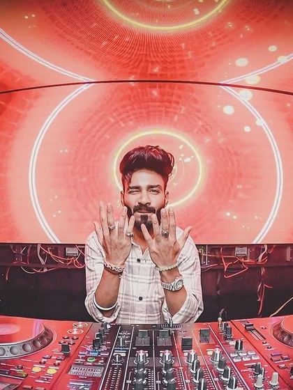 Posing for the camera while keeping the beats flowing at Error, Siliguri.