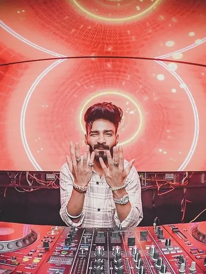 Posing for the camera while keeping the beats flowing at Error, Siliguri.