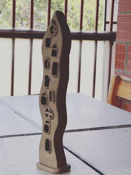 A final shot of the lamp sculpture before it goes into the kiln. Hand-building allows for so much freedom in form.