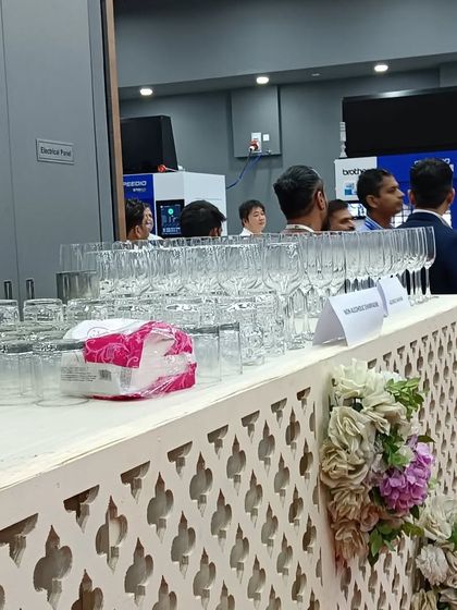 A wide view of a simple bar setup for a corporate launch, showing our ability to cater to all types of events.