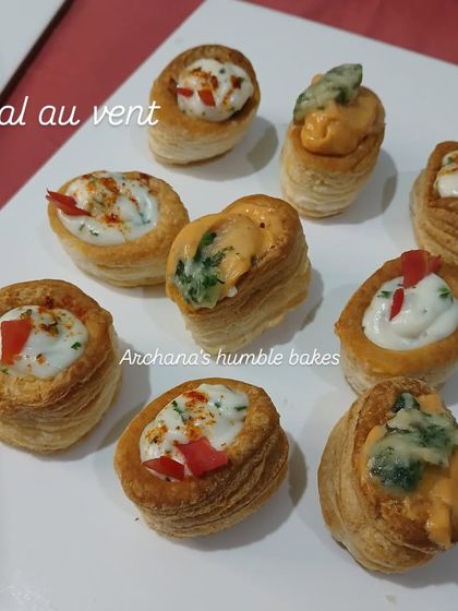 These are my vol-au-vents, which are small, hollow cases of puff pastry. I fill them with a variety of creamy vegetable and cheese fillings, making them a perfect bite-sized appetizer for parties.