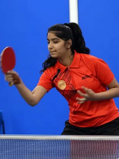This action shot captures a player in the middle of a powerful forehand stroke during a tournament. Her form and focus demonstrate the confidence that comes from dedicated practice.