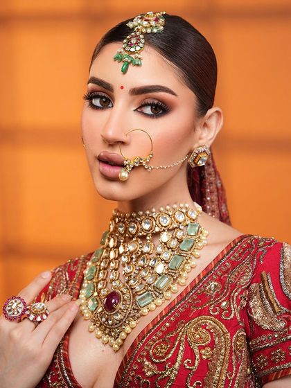 The complete vision of a royal bride, adorned in stunning jewels.