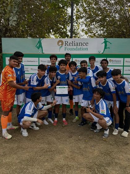The entire team celebrating Matvey Khatkar's Player of the Match award. Individual success is always a team victory at Frontier FC.