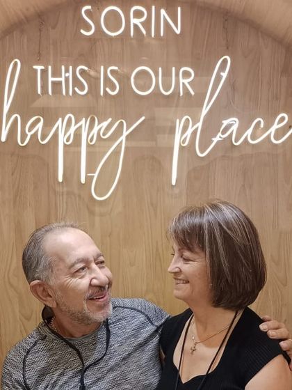 A close-up of a happy couple enjoying the serene atmosphere of the salon. Shared experiences like these are what make my work so rewarding.
