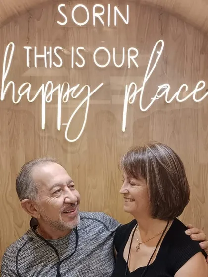 A close-up of a happy couple enjoying the serene atmosphere of the salon. Shared experiences like these are what make my work so rewarding.