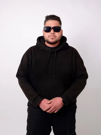 Strong, focused, and unstoppable. A simple but powerful portrait against a clean white background.