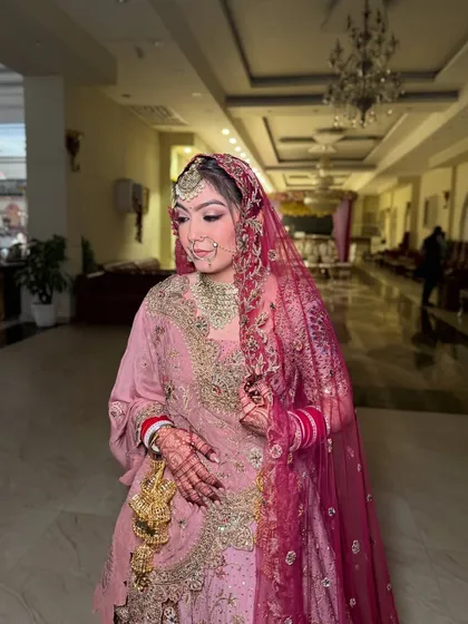 A final shot of the bride, looking poised and ready for her big day. The makeup is set to last through the entire event.