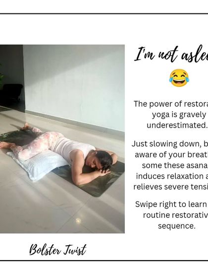 I'm not asleep, I promise. This is the power of restorative yoga. A simple bolster twist allows the body to release deep-seated tension with minimal effort.