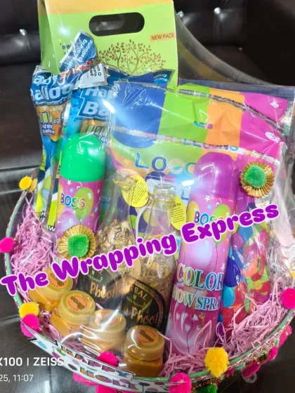 A Holi gift basket filled with colors, snacks, and everything you need for a fun party.