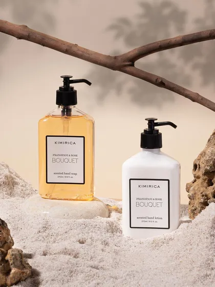A minimalist and earthy setup for Kimirica's hand soap and lotion. I used sand, rocks, and a dry branch to create a serene, nature-inspired aesthetic that complements the brand's clean design.