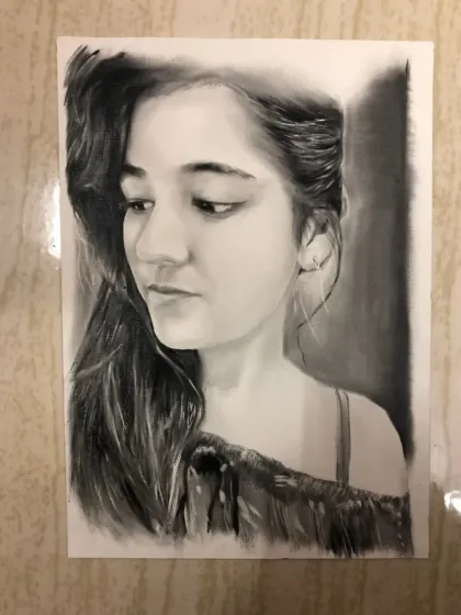 A gallery of my portraits created using the dry brush technique with black oil paint. This method allows for incredible realism and texture, perfect for capturing every detail from hair to clothing.