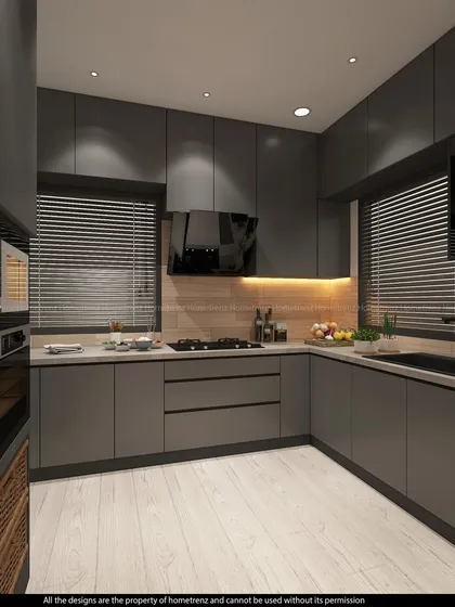 The kitchen is well-lit with both overhead spotlights and warm under-cabinet lighting, making it a pleasant space to work in.