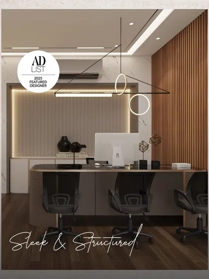 A workspace defined by sleek design and smart structure. The use of vertical wooden and fluted panels, paired with minimalist lighting, creates an office environment where aesthetics and function are one.